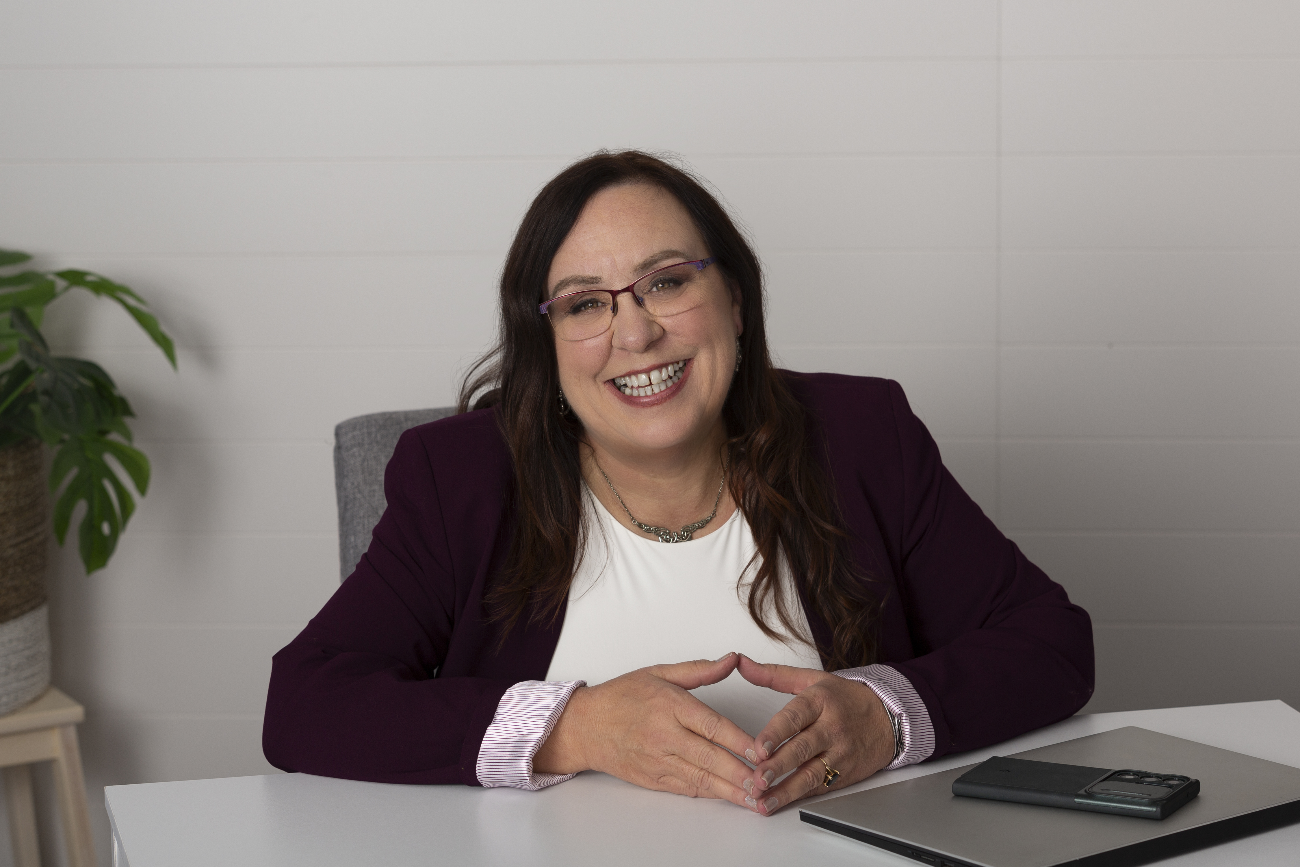 Executive headshot at desk